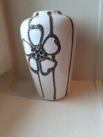 White brown ceramic vase with a classic shape but retro