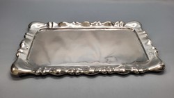 Old silver tray with blister pattern