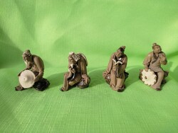 Four porcelain figurines from Xiamen