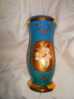 Glass vase with bohemian plastic porcelain flowers in a rare shade of blue, antique, serial number at the bottom