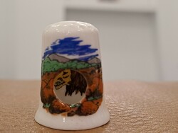 Fine bone china marked English porcelain thimble see the lion on the savanna lion side drilled
