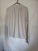 New elegant blouse in light gray with pearl decoration