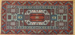 Egyedi, sorszámmal ellátott perzsa szőnyeg 128x62cm