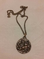 Long necklace with horoscope (leo) pendant