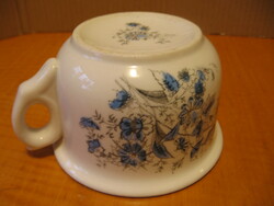 Antique bieder also has a blue flowered koma cup, koma mug, koma cup