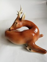 Royal dux: after a reclining doe buck, large size, flawless, marked, 25 cm