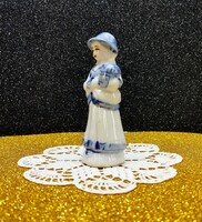 Small German porcelain female figure with a blue pattern