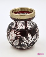 Old, small, peeled burgundy crystal vase, glass painted with copper-ruby stain, with silver rim.