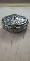 Beautiful silver-plated jewelry box decorated with a rich pattern