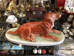 Porcelain dog from 1954, hand painted, signed, size 30 cm.