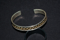 Silver bracelet with snakeskin effect decoration