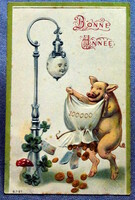 Antik dombornyomott Újévi üdvözlő képeslap malac zsákból pénzt szór utcai lámpa nevet lóhere gomba