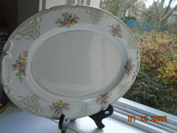 Antique giant oval marked bowl, relief pattern, colorful flower bouquet, baroque grid pattern