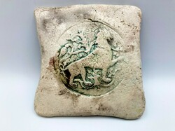 Raku ceramic image of a lion