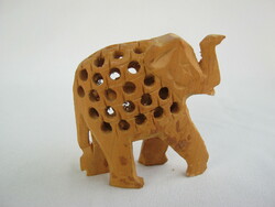 Elephant carved wooden figure with openwork pattern