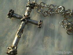 For half, a 7cm cross with a large chain