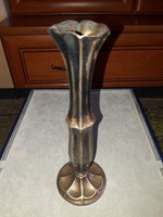 Metal vase with inscription 
