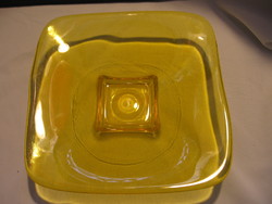 Yellow decorative bowl with candlestick