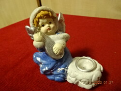 Porcelain figure, musical angel, also a candle holder. He has! Jokai.