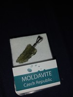 Original tested moldavite meteorite on a silver medallion!!!