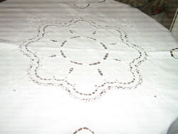 Beautiful hand-crocheted white elegant tablecloth with embroidered riceli