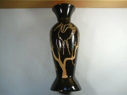 Retro old glazed ceramic vase with a stork