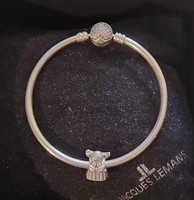 Pandora bracelet with angel charm and heart-shaped cubic zirconia clasp