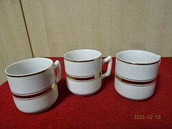 German porcelain coffee cup, three pieces, with gold stripe. Jokai.
