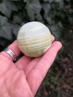 Pistachio calcite sphere, mineral