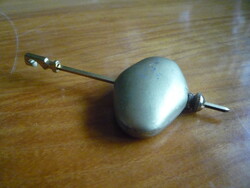 Small oval pendulum.
