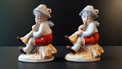 2 pcs. Old German porcelain figure. Seated boy playing a flute and wearing a hat. 8.5 cm.