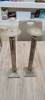 Pair of antique alpaca candle holders. 46 cm.