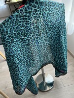 Crumpled large turquoise scarf, beach towel