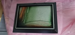 In the frame of a leather picture, approx. 15x20cm