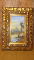 Egyiptomi tájat ábrázoló festmény gyönyörű keretben