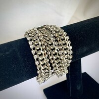 Old vintage bracelet, thick shiny steel jewelry from the 70s, thick metal