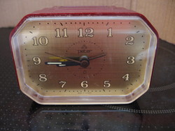 Retro burgundy plastic alarm clock