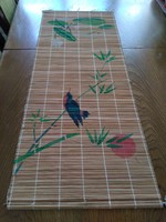 Old hand-tied and painted bamboo or reed table runner with painted bird decoration