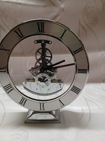Table clock with a transparent structure