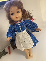 Presumably an American doll with a sweet face and side-moving eyes