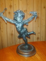 Putto angel. The material is spaiater, about 22 cm high