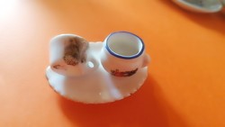Baby porcelain for a doll house. 62.