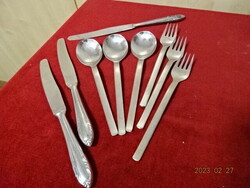 Chrome cutlery, three knives, three forks, three spoons. Villa is Israeli. Jokai.