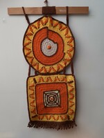 Crocheted retro wall decoration with an abstract pattern