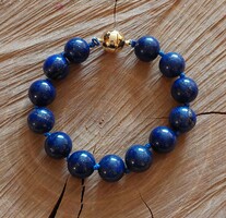 Beautiful lapis lazuli bracelet with knotted cord, gold-plated magnetic ball clasp