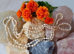 Real room. Extra long white freshwater pearl necklace made of selected beads, without clasp