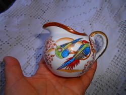 Antique hand-painted porcelain cream jug with a traditional Japanese pattern