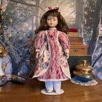Porcelain head doll with 40 cm stand, approx. 30-40 years old, in good condition
