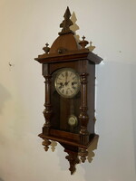 Small spring wall clock