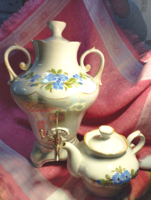 Antique porcelain samovar with eosin pattern